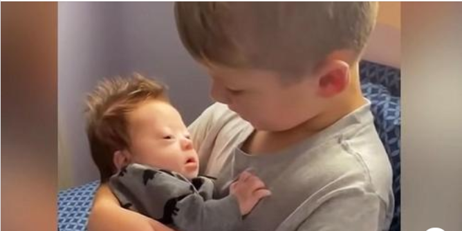 Boy Sings To Infant Brother And Says “Aren’t We All Different